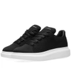 Alexander Mcqueen Exaggerated Sole Knitted Trainers In Black