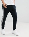 PROFOUND AESTHETIC JOGGERS WITH LOGO TAPING IN BLACK - BLACK,B-004