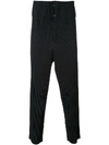 Issey Miyake Homme Plissé  Plissierte Hose Mit Tiefem Schritt - Schwarz In Black