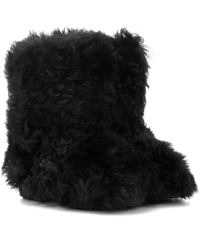 Saint Laurent Genuine Shearling Boot In Black
