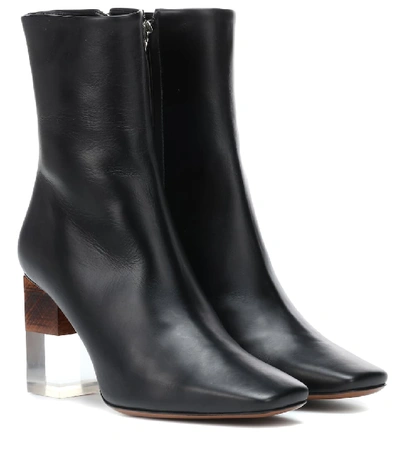 Neous Hea Leather Ankle Boots In Black