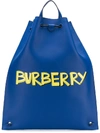 BURBERRY BURBERRY GRAFFITI PRINT BONDED LEATHER DRAWCORD BACKPACK - BLUE