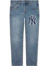 GUCCI TAPERED YANKEES LOGO JEANS