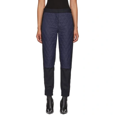 Tibi Mix Media Quilted Jogger Trousers In Navy