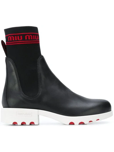 Miu Miu Knit Logo Boots In Black