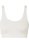 WE/ME THE UNIVERSAL REVERSIBLE STRETCH-JERSEY SPORTS BRA