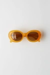 ACNE STUDIOS Oval sunglasses orange/brown
