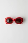 ACNE STUDIOS Oval sunglasses red/brown