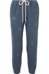THE GREAT THE CROPPED EMBROIDERED COTTON-JERSEY TRACK trousers