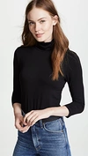 L Agence Aja Tortoiseshell Print Jersey Turtleneck Top In Black