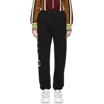 Gucci Large Logo Print Track Trousers In 1289 Black