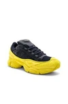 ADIDAS ORIGINALS ADIDAS BY RAF SIMONS OZWEEGO IN BLACK,YELLOW