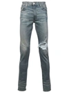 AMIRI AMIRI DISTRESSED SKINNY JEANS - BLUE