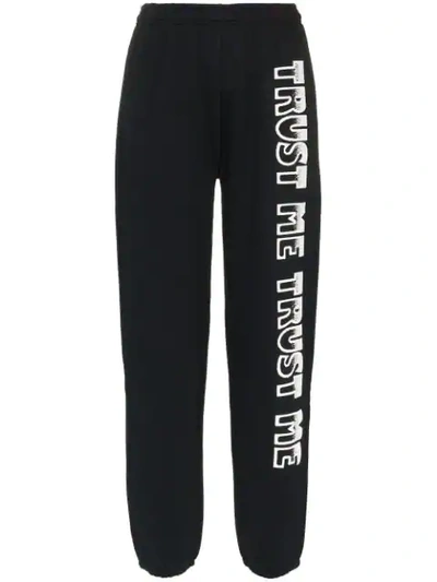 Ashley Williams Text Print Cotton Track Pants In Black