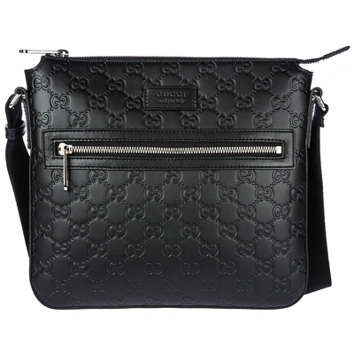 Gucci Signature Embossed Messenger Bag In Black