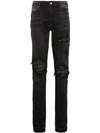 AMIRI SLIM-FIT DISTRESSED COTTON AND LEATHER JEANS