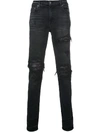 AMIRI RIPPED SLIM FIT JEANS