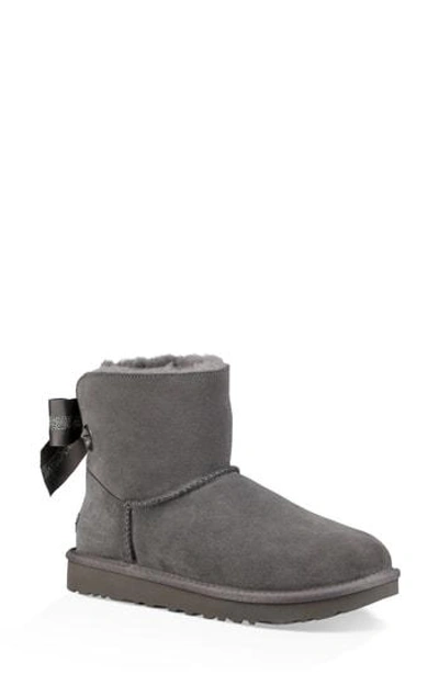 Ugg Mini Bailey Bow Ii Genuine Shearling Bootie In Grey