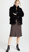 Apparis Skylar Faux Fur Tiered Short Coat In Noir