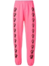 ASHLEY WILLIAMS ASHLEY WILLIAMS PRINTED FACES TRACK PANTS - PINK
