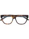 Saint Laurent Oval Shaped Glasses In Brown