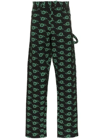 Ashley Williams Rose Print Trousers In Black