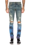 Amiri Thrasher Palm Tree-print Slim-fit Skinny Jeans In Inc Indigo