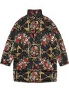 GUCCI PADDED CAPE COAT WITH FLOWERS AND TASSELS