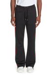 GUCCI TECHNICAL JERSEY FLARE PANTS,493657X7A90