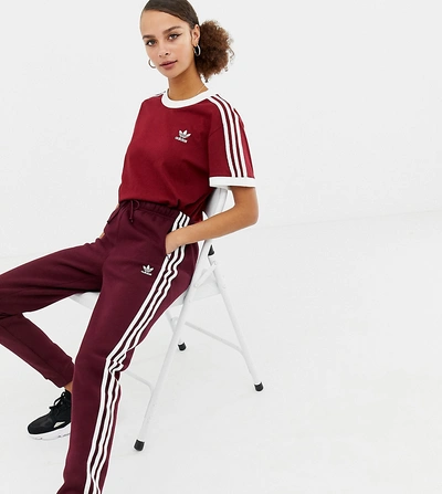 Adidas Originals Three Stripe Track Pants In Burgundy-red | ModeSens