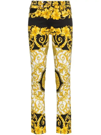 Versace Baroque Low-rise Patterned Skinny Jeans In F.do Nero Stampa Oro