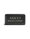 GUCCI GUCCI LOGO PRINT ZIP AROUND WALLET - BLACK