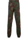 OFF-WHITE OFF-WHITE CAMOUFLAGE PRINT TRACK PANTS - GREEN