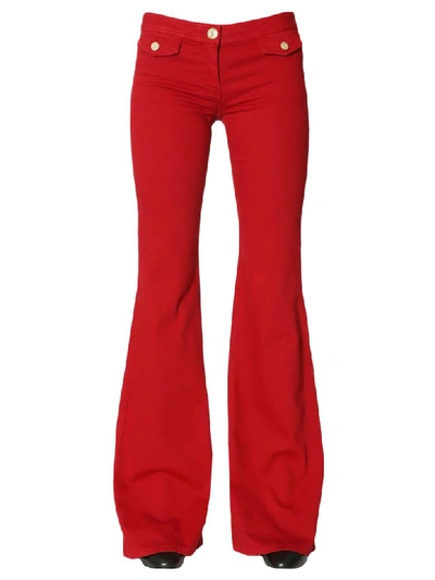 Balmain Denim Stretch Flare Trousers In Red