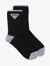 Prada Jacquard Triangle Logo Socks In Black