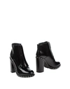 Dolce & Gabbana Solid Color Ankle Boots In Black