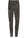 OFF-WHITE STENCIL CAMOUFLAGE TROUSERS,10784792