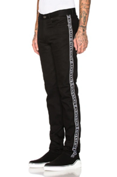 Givenchy Slim Fit Denim Trousers W/ Logo Bands In Black