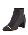 Ferragamo Vara Chain Leather Ankle Boots In Black