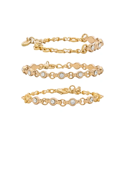 Ettika Rhinestone Chain Bracelet Set In Metallic Gold.