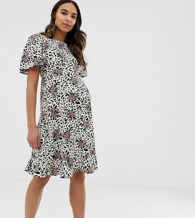 Queen Bee Maternity Shift Dress With Fluted Hem In Floral Leopard-black