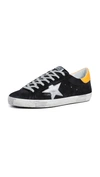 Golden Goose Distressed Superstar Sneakers In Black/silver