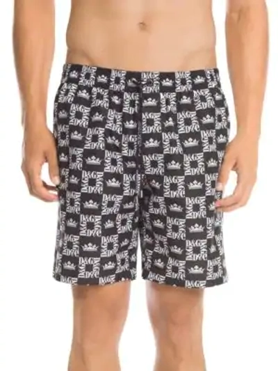 Dolce & Gabbana Mid Swimming Trunks With Crown Print And Pouch Bag In Black