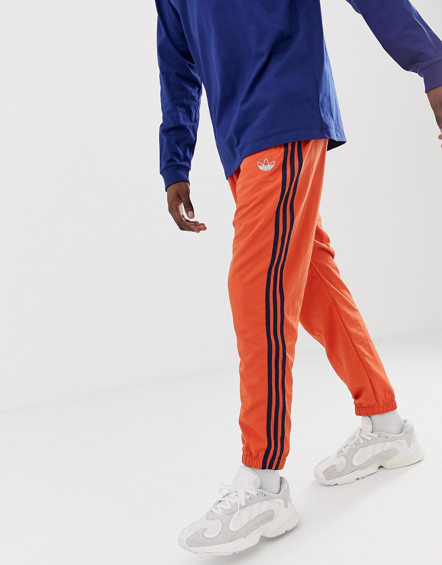 orange sweatpants in store