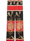 GUCCI SILK PANT WITH FLOWERS AND TASSELS