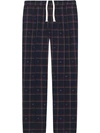 GUCCI GG CHECK JOGGING TROUSERS.