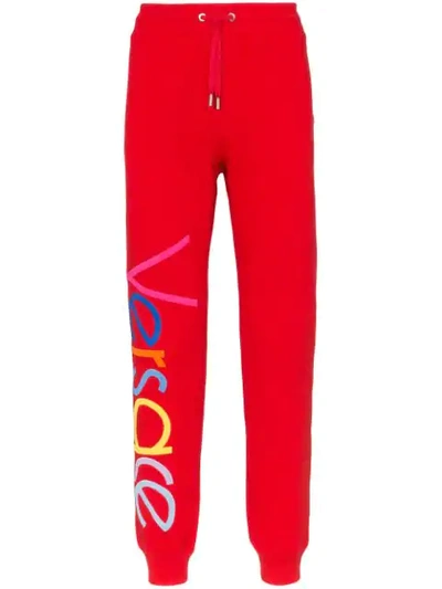 Versace Logo Embroidered Cotton Track Trousers In Red