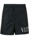 Valentino Vltn Logo Printed Swim Shorts In Blue