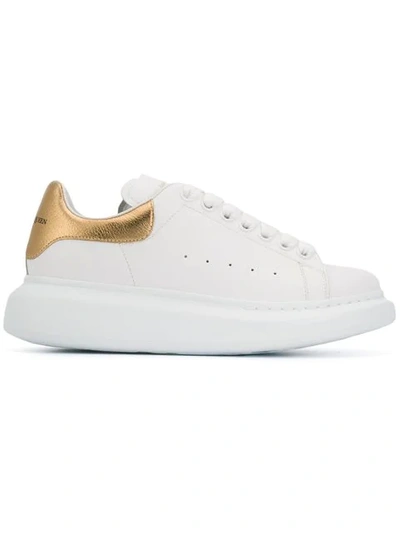 Alexander Mcqueen Metallic Oversized Low-top Sneakers In White Gold