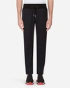 DOLCE & GABBANA JOGGING TROUSERS IN COTTON WITH BRANDED LABEL